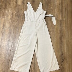 Shinestar Cream Sleeveless Jumpsuit with Wide-Leg Design keyhole back tie back